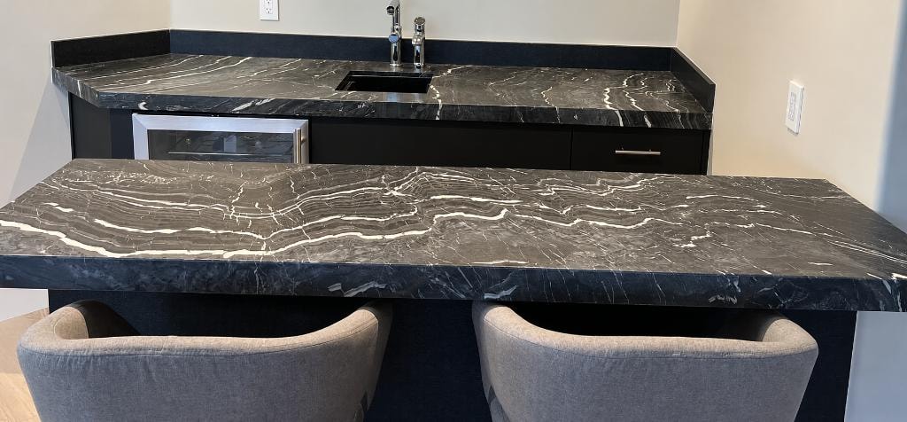 Black marble countertop fabrication and installation by TCB Interiors